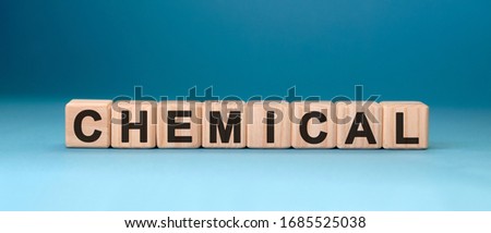 CHEMICAL word cube on a blue background. Medical concept.