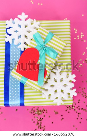 Colorful presents with luxury ribbons  on color  background