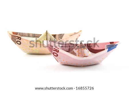 Ship made of money isolated on a white  background.