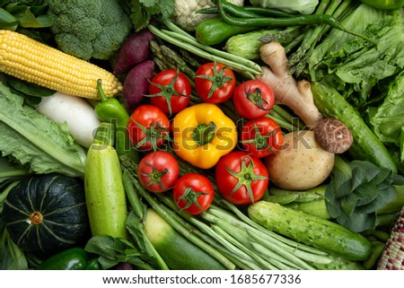 a flower picture designed with various fresh vegetables