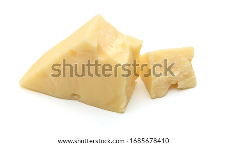 Cubes of cheddar cheese isolated on white  Royalty-Free Stock Photo #1685678410