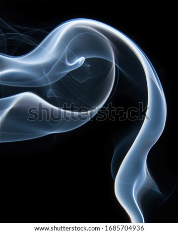 Smoke dancing in the dark