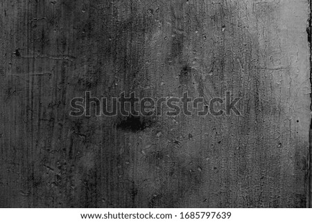 Gray colored abstract wall background with textures of different shades of gray