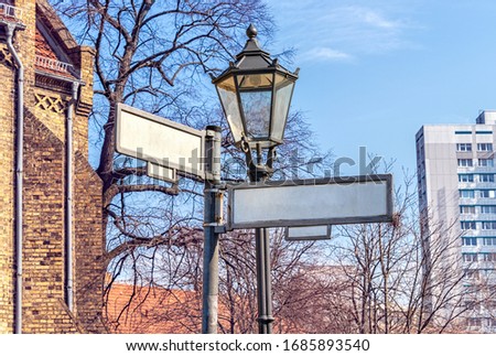 2 Blank Street Signs And Old Street Lamp
