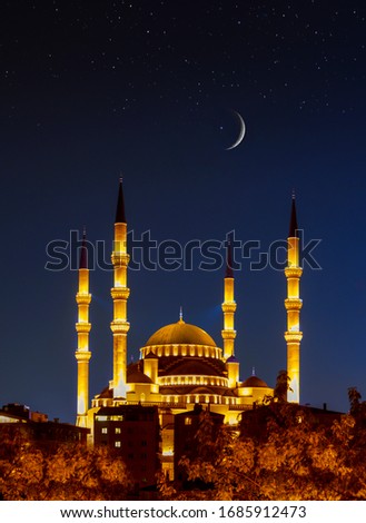 The biggest one is Kocatepe Mosque at night under crescent and stars, Ankara, Turkey Royalty-Free Stock Photo #1685912473
