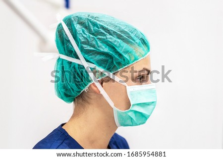 Covid-19 outbreak. Healthcare worker. Nurse working in intensive care unit . Royalty-Free Stock Photo #1685954881
