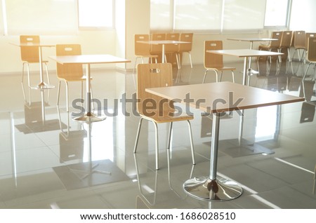 set of table and chairs in room as a social distancing long for protect and prevent spread of virus in interior room for health care of people life. social distance for Corona virus concept  Royalty-Free Stock Photo #1686028510
