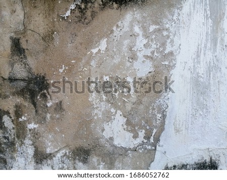 The​ pattern​ of​ surface​ wall​ concrete​ damaged​ by​ rust​y​ for ​background. Abstract​ of​ surface​ wall​ concrete​ for​ vintage​ background.  Rust​ wall​ for​ paper​ background​