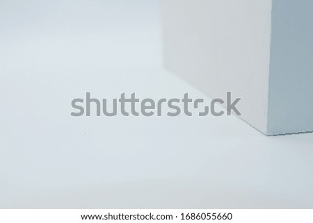 
Part of box on white table, white background