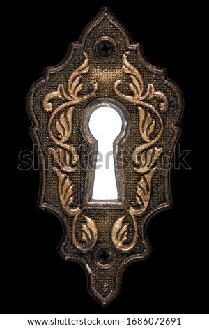 Bright light in the keyhole, decorative design element, isolated on black background Royalty-Free Stock Photo #1686072691