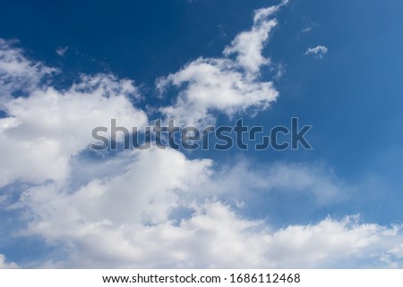 Bright blue sky and fluffy white clouds, wallpaper, horizontal