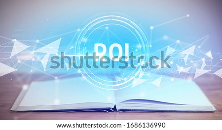 Open book with ROI abbreviation, modern technology concept
