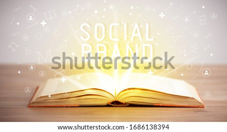 Open book with SOCIAL BRAND inscription, social media concept