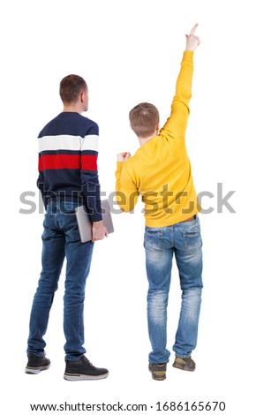 Back view two man in sweater with laptop. Rear view people collection. backside view of person. Isolated over white background. Guys looking forward