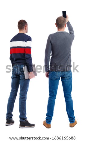 Back view two man in sweater with laptop. Rear view people collection. backside view of person. Isolated over white background. Guys looking forward