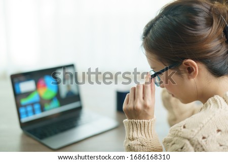 Woman using laptop making video call to partner, looking at screen with conference. work from home.