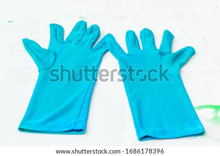 Close-up background of scientific equipment (gloves, colored glass tubes, syringes, glasses,) for use in trials or medical parts for convenient use
