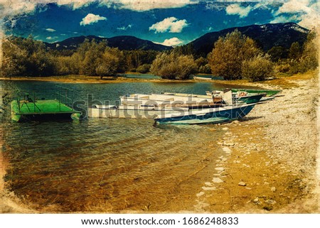 Boat on a lake shore. Lake background, old photo effect.