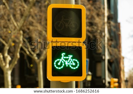 Traffic lights for bicycles on a beautiful sunny day in Barcelona. Green light for sports concept. Healthy living