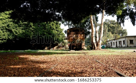 Old Train Station in Beirut City is now a recreation site with vintage locomotive and wagons under centenarian trees.