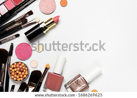 Set of decorative cosmetics on a white background. Flat lay, top view. Royalty-Free Stock Photo #1686269623