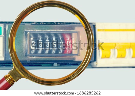utilities, electricity bills, close-up electric meter Royalty-Free Stock Photo #1686285262