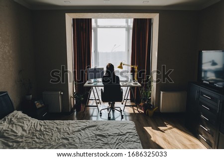 woman working on laptop at home. telework Royalty-Free Stock Photo #1686325033