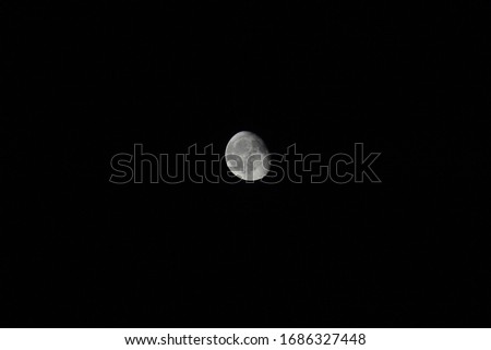 
picture of an amazing moon on a dark starless night