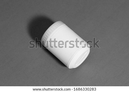 Plastic Jar Mock-up with lid on gray background.High resolution photo.