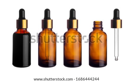 Collection set of empty transparent brown dropper bottle with pipette for canning and preserving isolated on white background with clipping path. Royalty-Free Stock Photo #1686444244