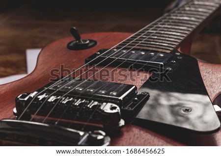 Electric guitar with sheet music