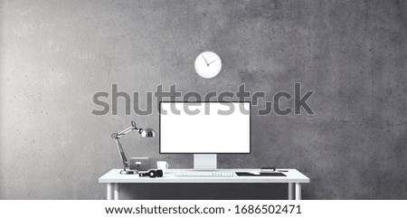 New computer display and office tools on desk. Blank desktop computer screen. Modern creative workspace background. Front view.