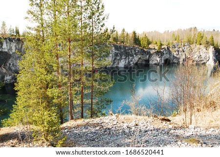 Mountain park Ruskeala is tourist complex located in Sortavala region of Republic of Karelia Russia. Former marble quarry filled with groundwater. open cave in forest