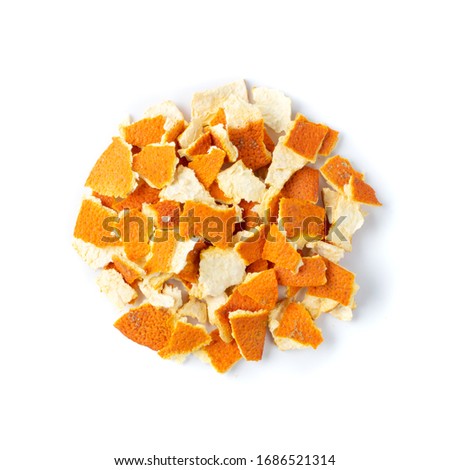 Heap of Dry Sliced Orange Peel Isolated on White Background. Chopped Zest Photographed with Natural Light Top View Royalty-Free Stock Photo #1686521314