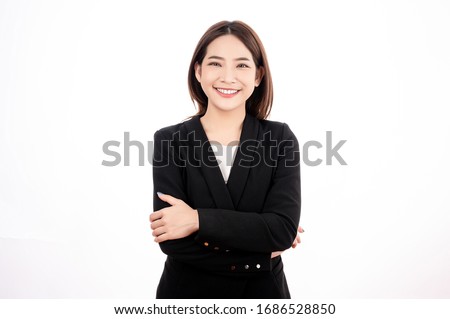Asian businesswoman with black suit pretent crossed pose in white isolated background. Smart, confident, business, presenter concept.
 Royalty-Free Stock Photo #1686528850
