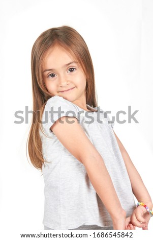 happy 3 year old girl on white background