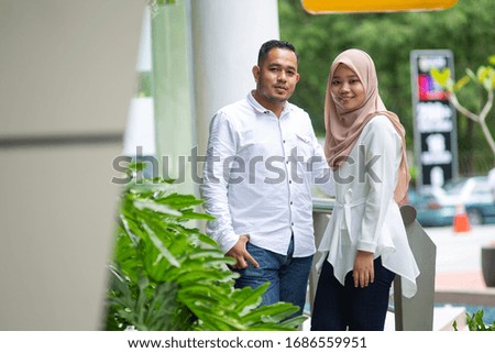 Portrait young muslim couple.Sweet couple during prewedding photoshot.creative outdoor photo shoot. Selective focus.