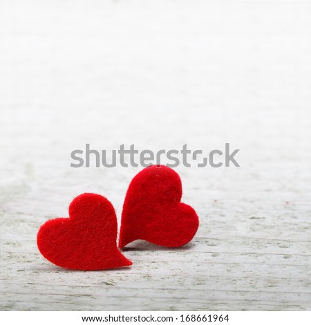 valentines day background with two hearts on wooden background