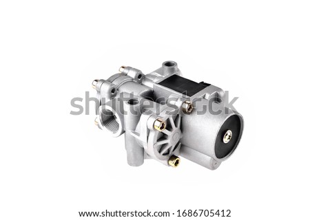 ABS modulator of the brake system with a magnetic valve for a truck, auto part, car brake system part white background close-up Royalty-Free Stock Photo #1686705412