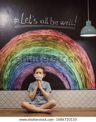 let's all be well. child at home draws a rainbow on the wall. Flash mob society community on self-isolation quarantine pandemic coronavirus. Children create artist paints creativity vacation