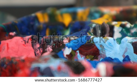 Color mixing tray colorful texture background.
