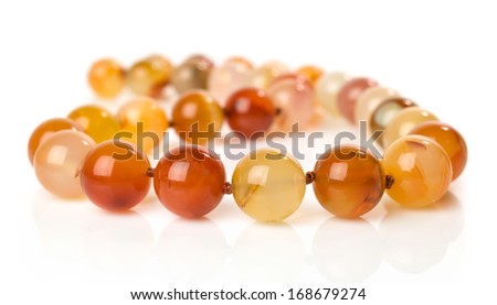 Carnelian necklace isolated on white