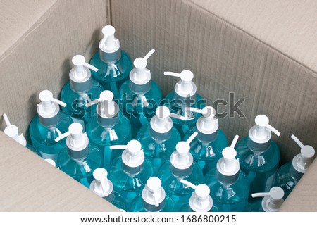 hand sanitizer container box delivery self isolate covid-19 outbreaking contagious disease Royalty-Free Stock Photo #1686800215
