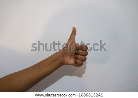 thumbs up on a white background