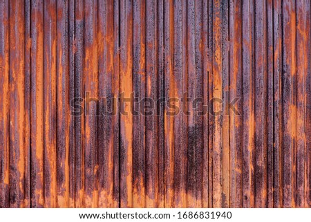 Vintage metal rust wall with vertical stripes