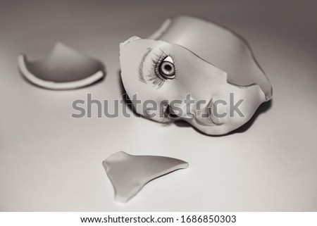 Broken head of the doll, abstract Royalty-Free Stock Photo #1686850303