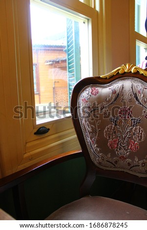 old chair at the window, ottoman 
architecture