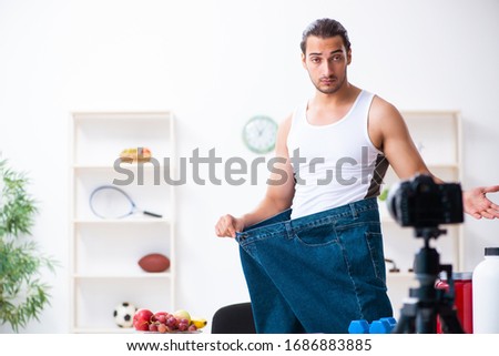 Young male blogger in dieting concept