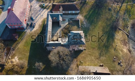 Latvia, Limbazi Medieval Castle Ruins. Aerial View of the 13 Th Century Castle. Stone Ruins With New Created High Observation Tower. Church and City in Background