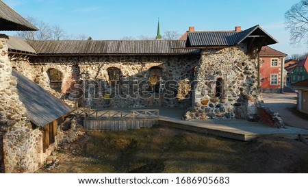 Latvia, Limbazi Medieval Castle Ruins. Aerial View of the 13 Th Century Castle. Stone Ruins With New Created High Observation Tower. Church and City in Background
